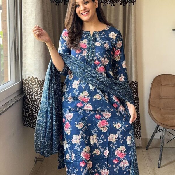 . Featuring flowy pattern kurta with straight pants and matching dupatta, this set is exclusively